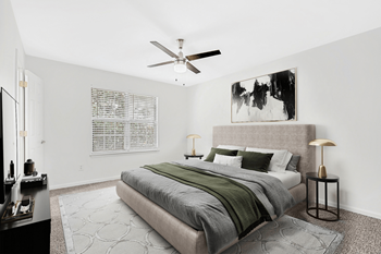 Bedroom With Ceiling Fan at Caveness Farms Apartments, Wake Forest North Carolina 